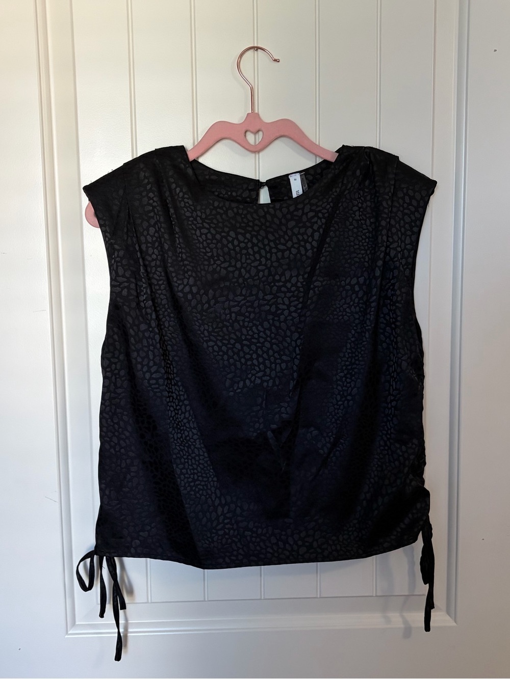black shoulder pad top
